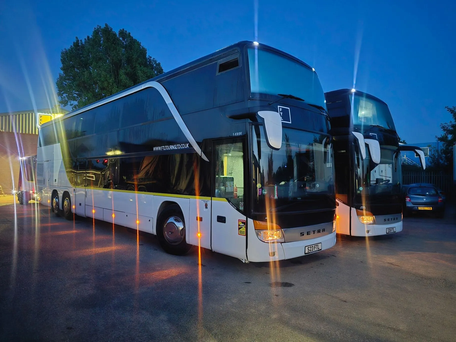 Two FTL Setra S431 DT nightliners at dusk