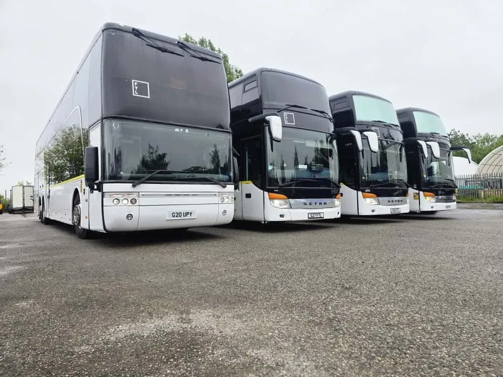 Four FTL Touring nightliners lined up at the depot